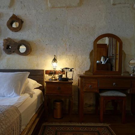 Eyes Of Cappadocia Cave Hotel Üchisar Bagian luar foto