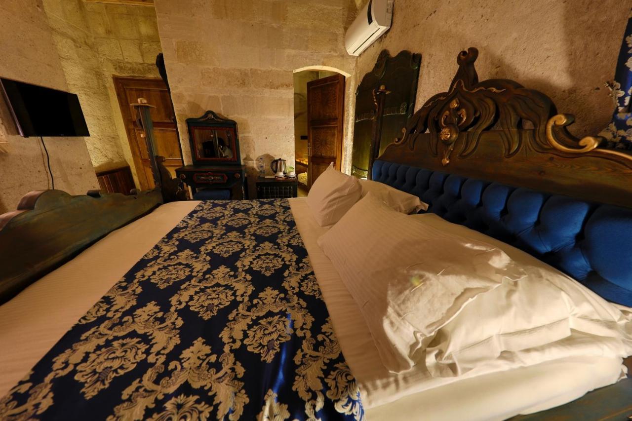 Eyes Of Cappadocia Cave Hotel Üchisar Bagian luar foto