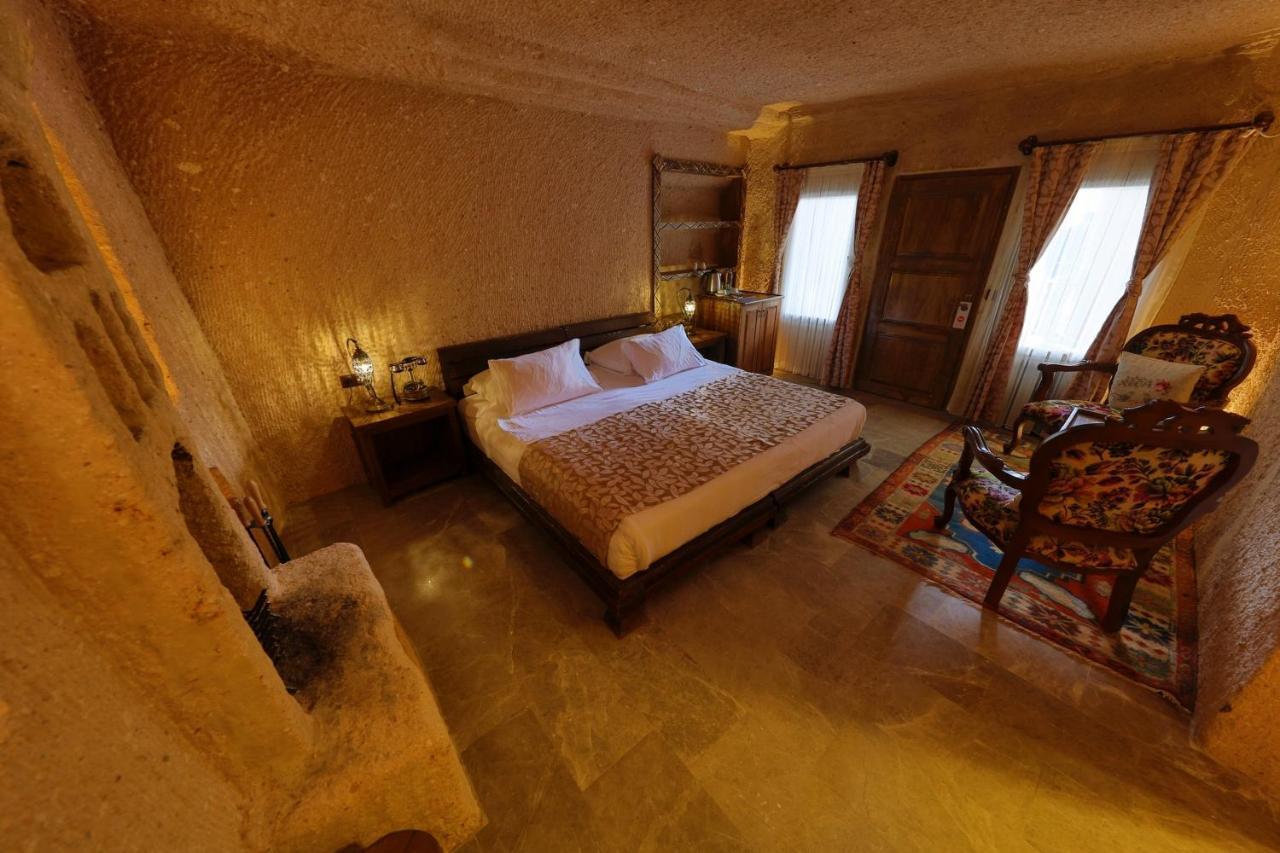 Eyes Of Cappadocia Cave Hotel Üchisar Bagian luar foto