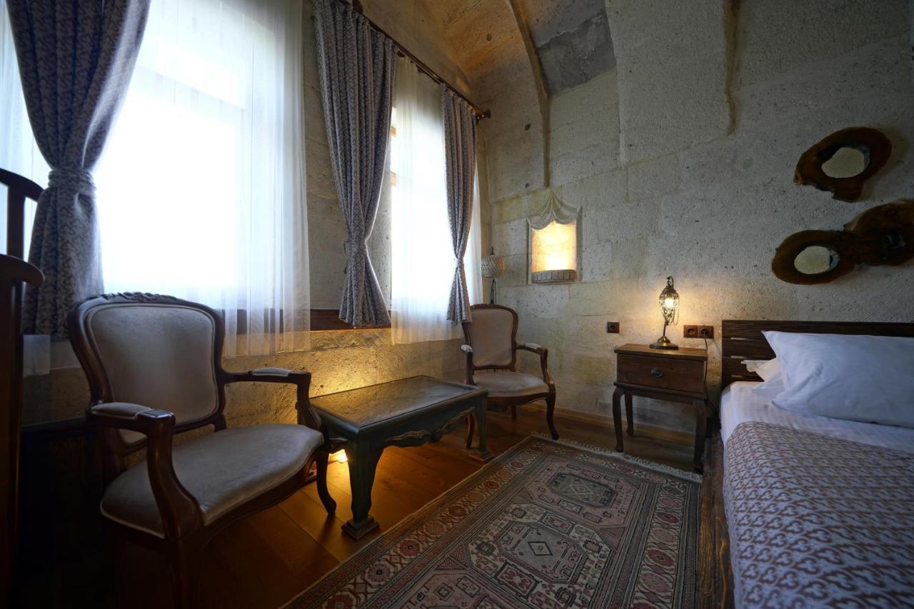 Eyes Of Cappadocia Cave Hotel Üchisar Bagian luar foto