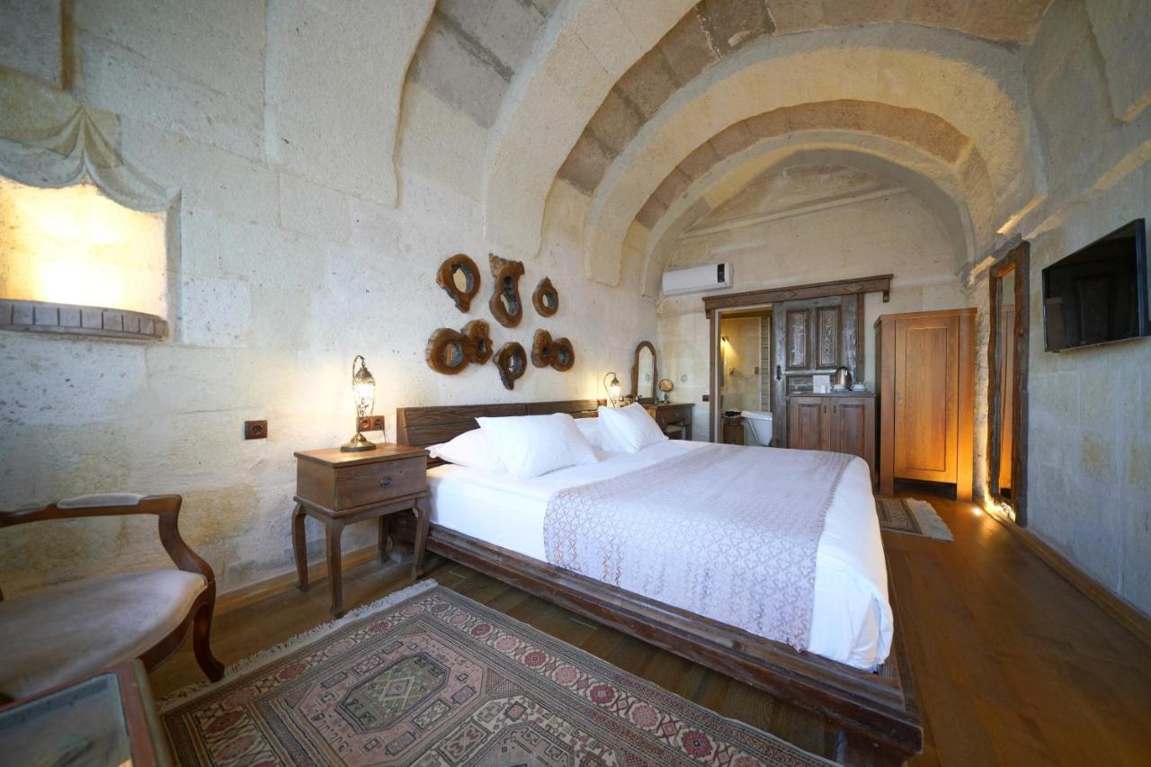 Eyes Of Cappadocia Cave Hotel Üchisar Bagian luar foto