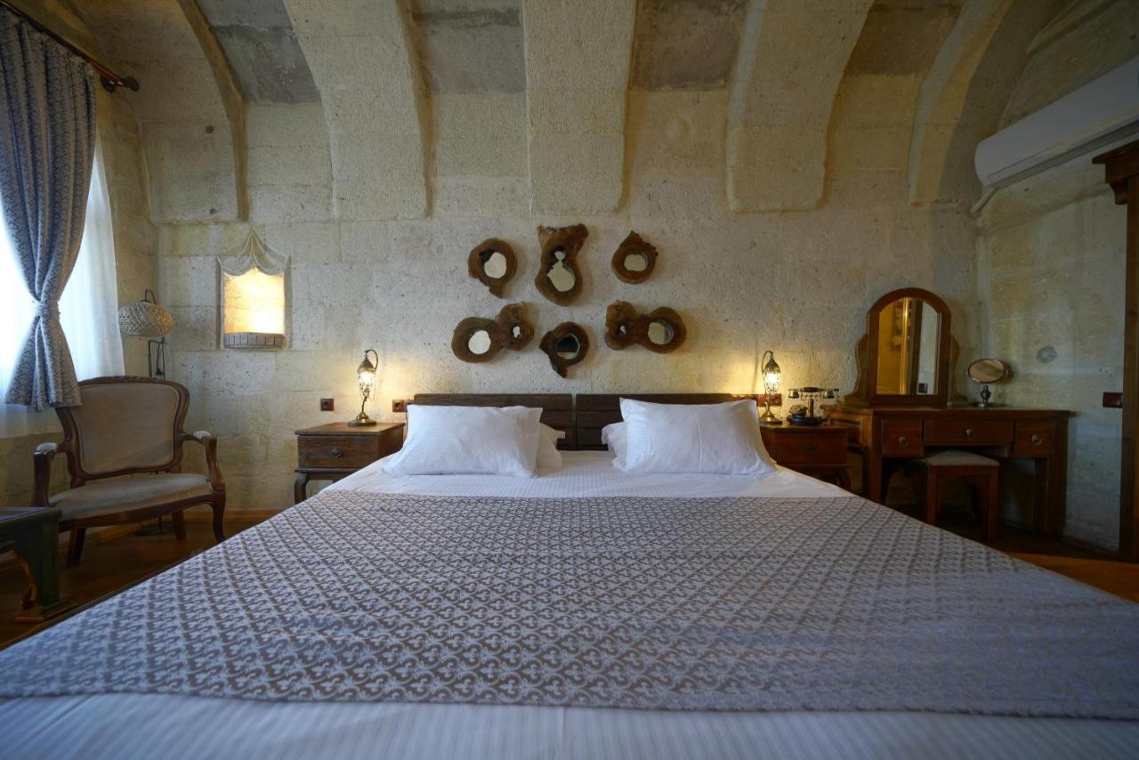 Eyes Of Cappadocia Cave Hotel Üchisar Bagian luar foto